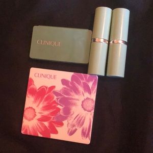 Clinique lipsticks, eye palettes and cosmetic bags